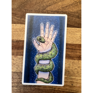 Snake wrapped around a hand. Numb.
